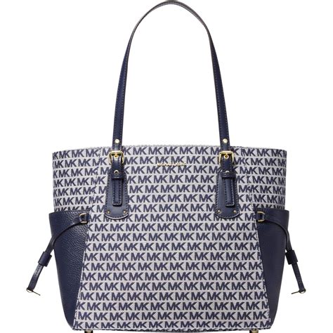 michael kors east west tote leopard|Michael Kors voyager signature tote.